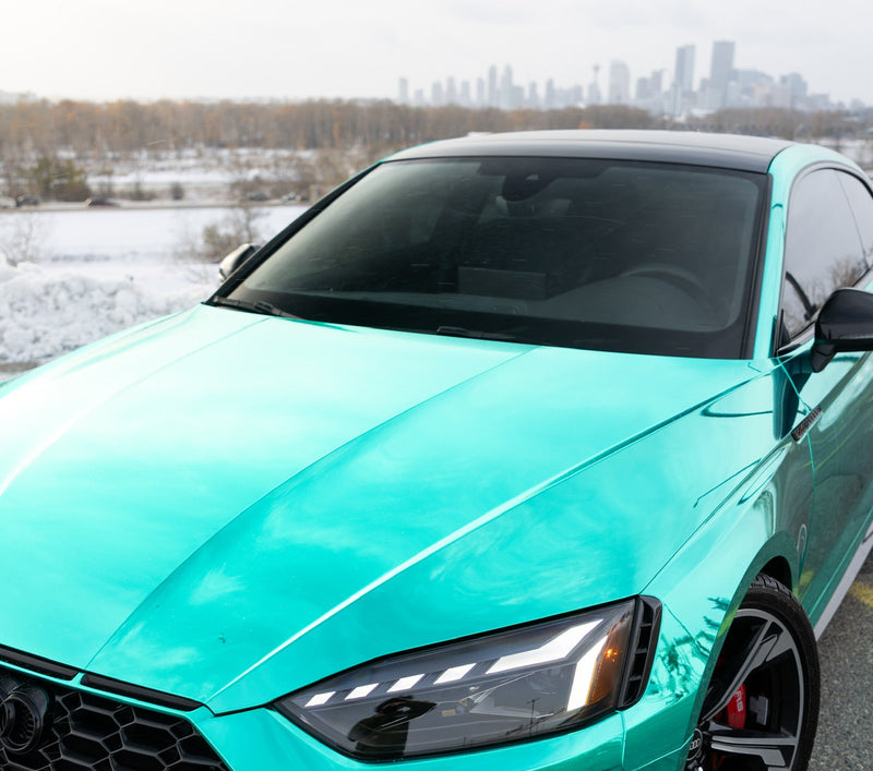 Teal chrome wrapped Audi coupe with premium colour change vehicle wrap and paint protection film installed by wraptors calgary 