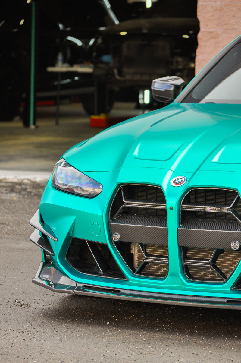 BMW M3 front hood and grille wrapped in matte chrome emerald green coloured PPF Calgary, luxury vinyl wrap Calgary project