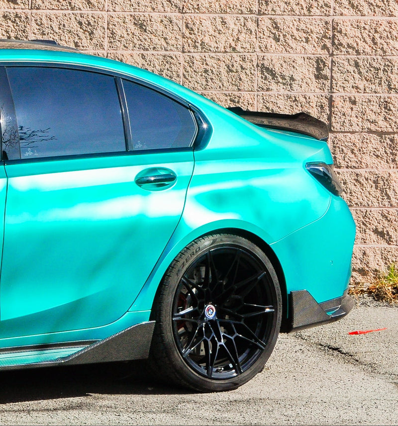 BMW M3 side panel and rear door detail emerald green coloured PPF Calgary, high end vinyl wrap Calgary installation
