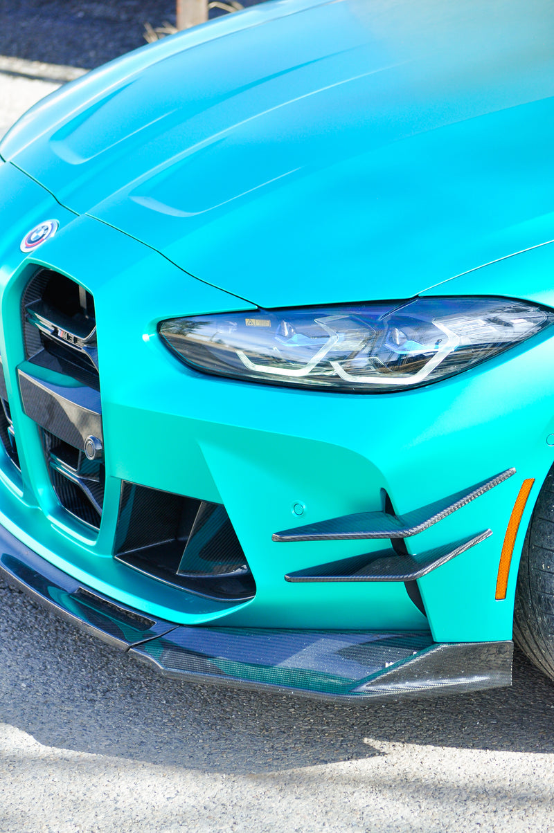 BMW M3 headlight and front bumper close up matte chrome emerald green coloured PPF wrap Calgary, custom car wraps Calgary
