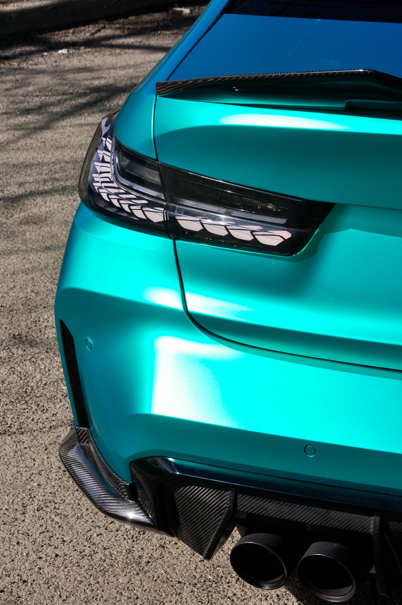 Rear quarter panel BMW M3 matte chrome emerald green coloured PPF wrap Calgary, premium car wrap finish detail Wraptors